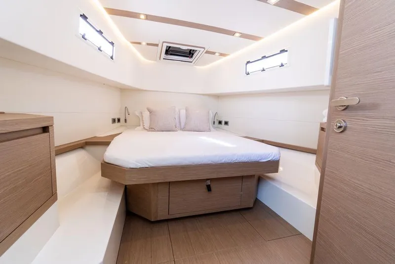 Slide: The Image of Cockpit of 2022 Pardo Yachts 38 with modern controls and ocean view. - 38
