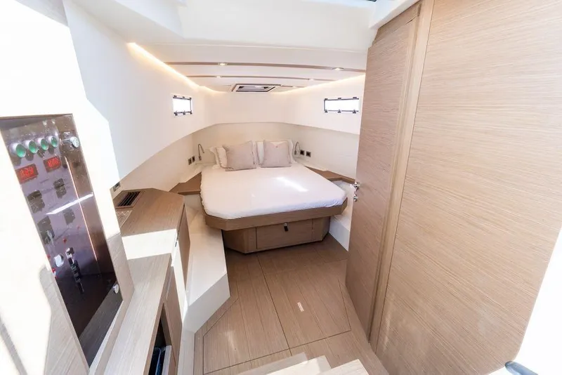 Slide: The Image of Interior view of 2022 Pardo Yachts 38, featuring sleek helm and comfortable seating. - 40