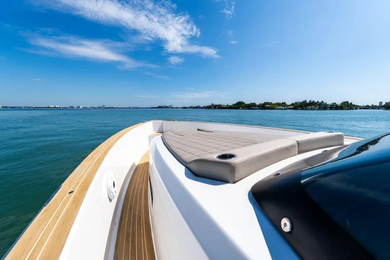Slide: The Image of 2022 Pardo Yachts 38 interior with sleek design and modern seating on a sunny day. - 46