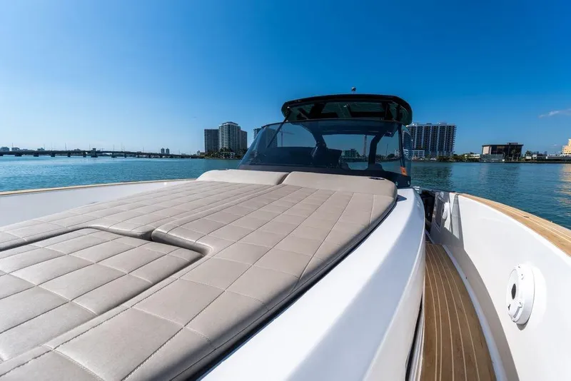 Slide: The Image of 2022 Pardo Yachts 38 luxury deck with seating, overlooking serene waters. - 49