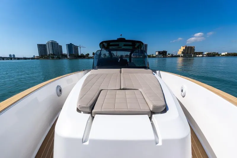 Slide: The Image of 2022 Pardo Yachts 38 with scenic waterfront view and modern seating area. - 50