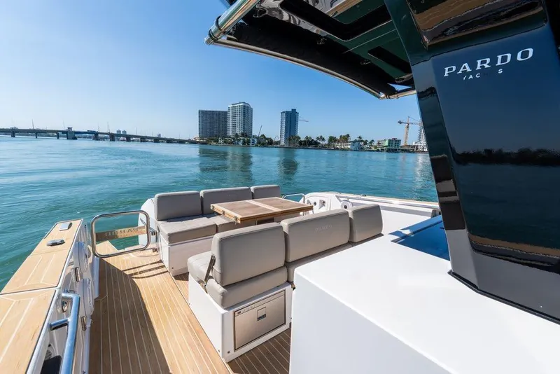 Slide: The Image of 2022 Pardo Yachts 38 cruising on open water under a clear sky. - 6