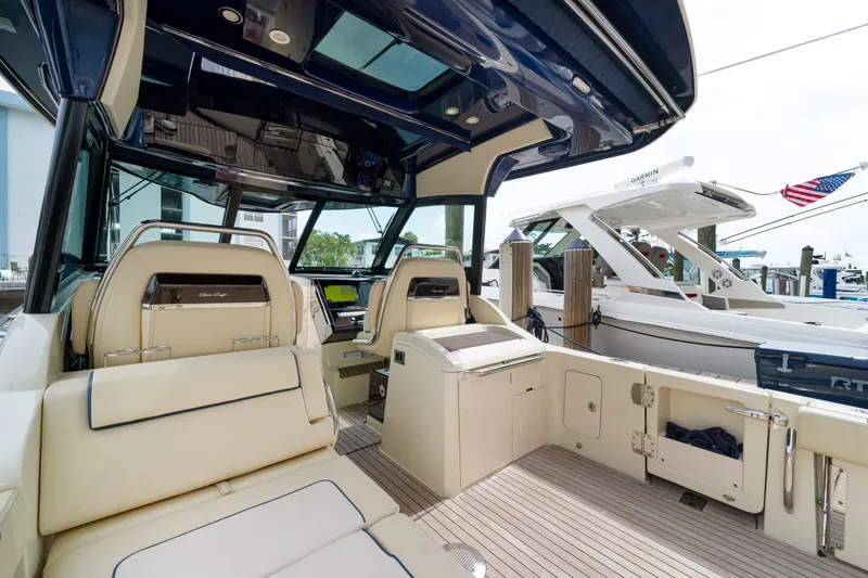Slide: The Image of 2022 Chris-Craft Calypso 35 interior with luxurious seating and modern design. - 24