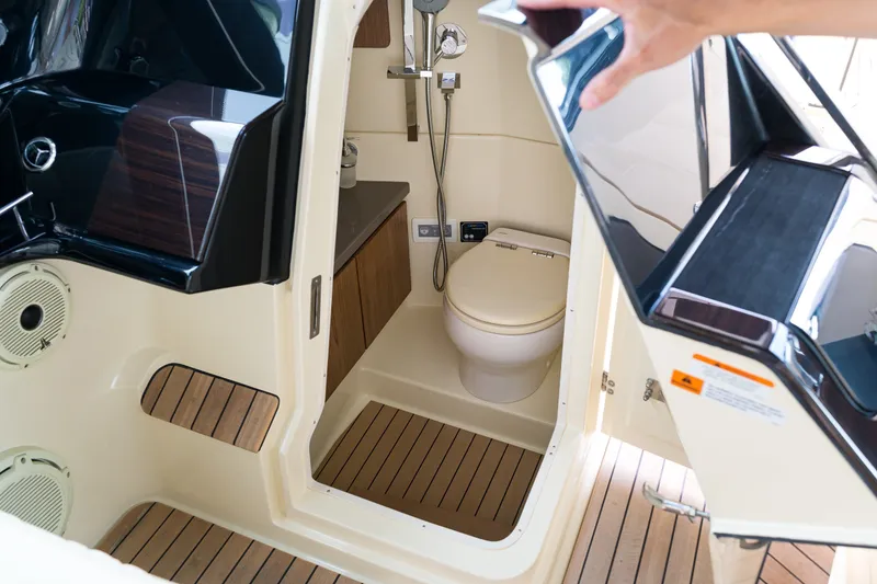 Slide: The Image of 2022 Chris-Craft Calypso 35 boat interior with modern bathroom amenities. - 28