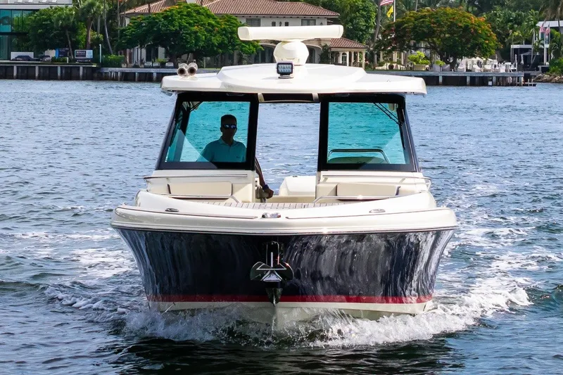 Slide: The Image of 2022 Chris-Craft Calypso 35 cruising on a scenic waterway. - 10
