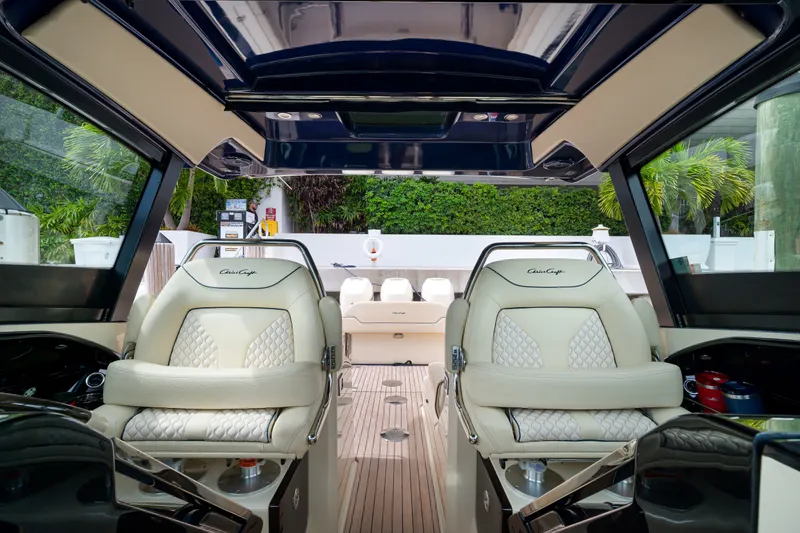 Slide: The Image of Interior of 2022 Chris-Craft Calypso 35 boat with luxurious seating and modern design. - 21