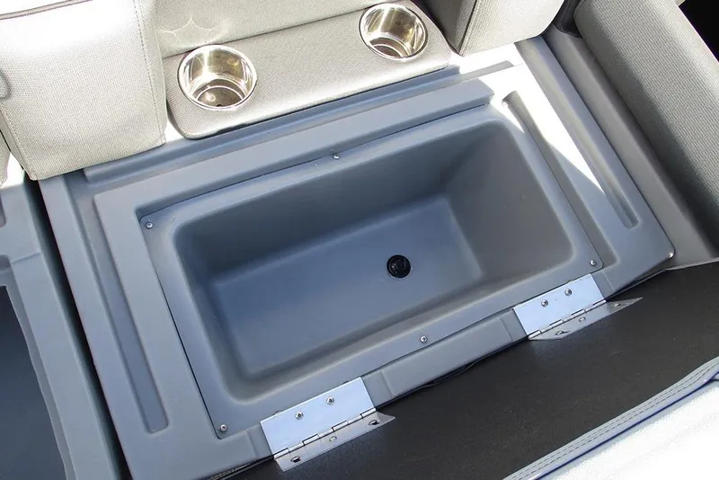 Slide: The Image of Interior view of 2026 Bentley Pontoons Fish 240 N-Cruise with storage compartment and cup holders. - 19