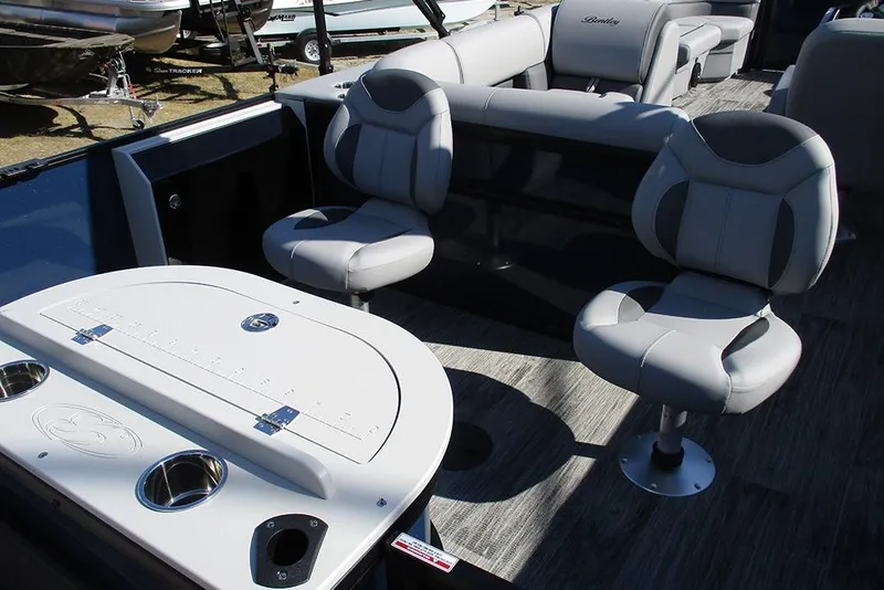 Slide: The Image of 2026 Bentley Pontoons Fish 240 N-Cruise interior with plush seating and fishing amenities. - 22