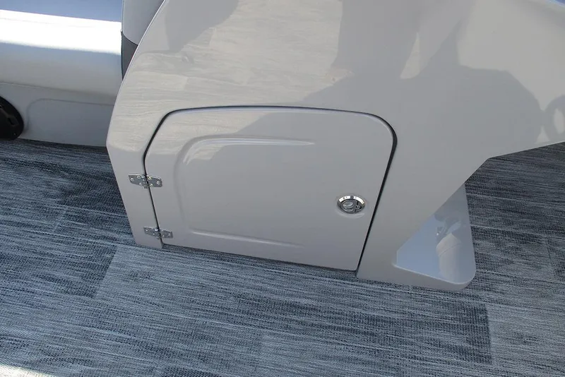 Slide: The Image of 2026 Bentley Pontoons Fish 240 N-Cruise storage compartment on textured flooring. - 26