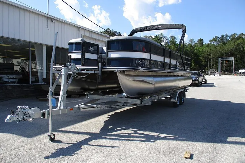 Slide: The Image of 2026 Bentley Pontoons Fish 240 N-Cruise on trailer outside dealership. - 3