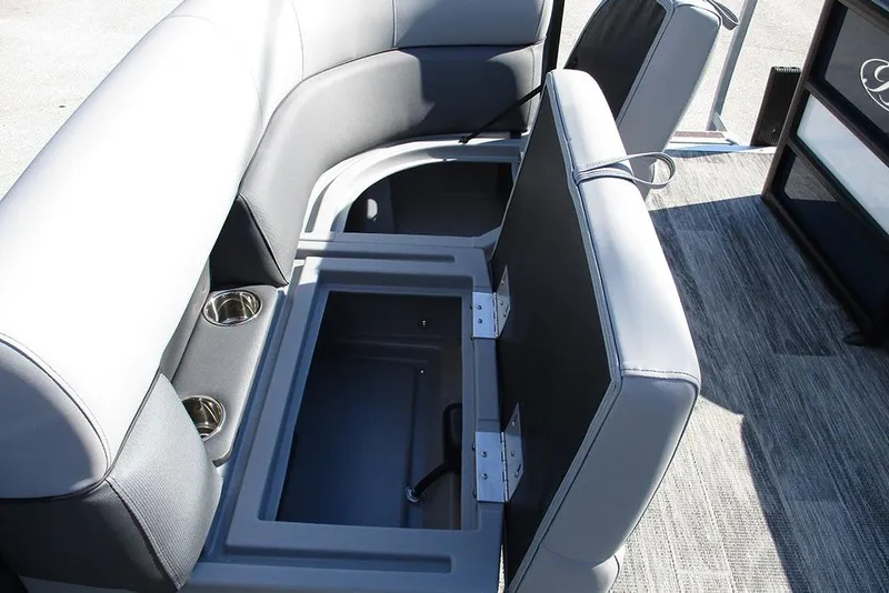Slide: The Image of 2026 Bentley Pontoons Fish 240 N-Cruise interior seating with storage compartment open. - 9