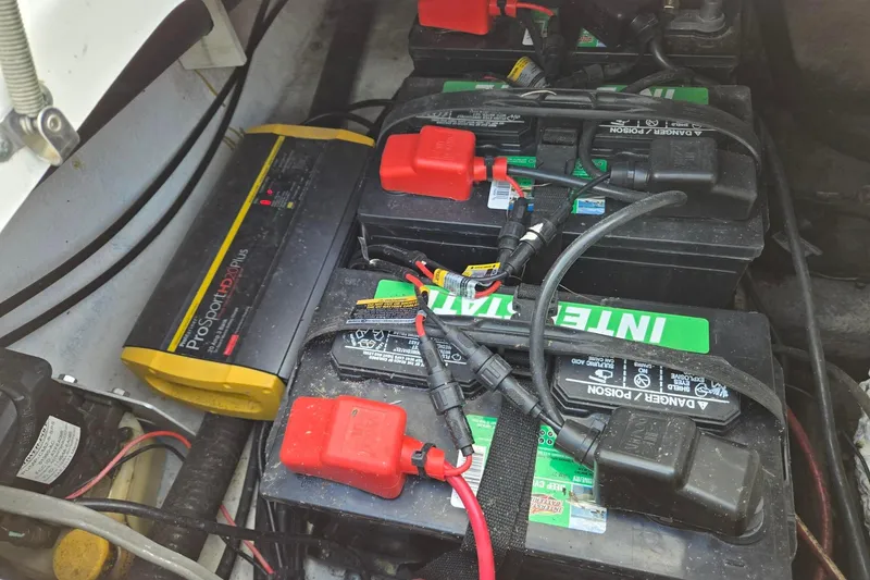 Slide: The Image of Battery setup in a 2012 Sea Hunt Ultra 225 boat with ProSportHD charger. - 25