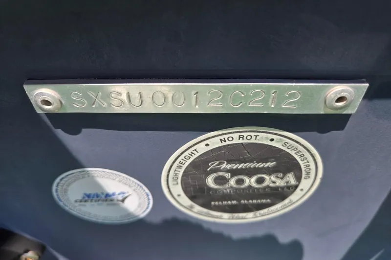 Slide: The Image of 2012 Sea Hunt Ultra 225 boat identification plate and Coosa composite label. - 29