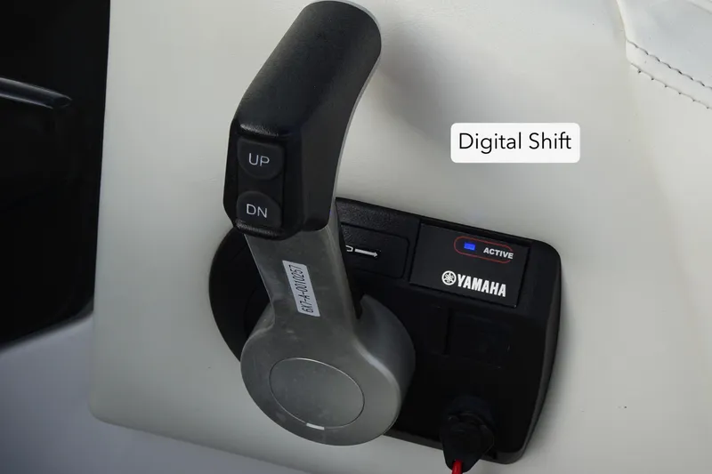 Slide: The Image of Digital shift control on a 2017 Monterey M-65 boat with Yamaha branding. - 22