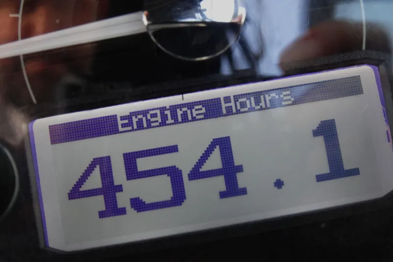 Slide: The Image of Digital display showing 454.1 engine hours on a 2017 Monterey M-65. - 24