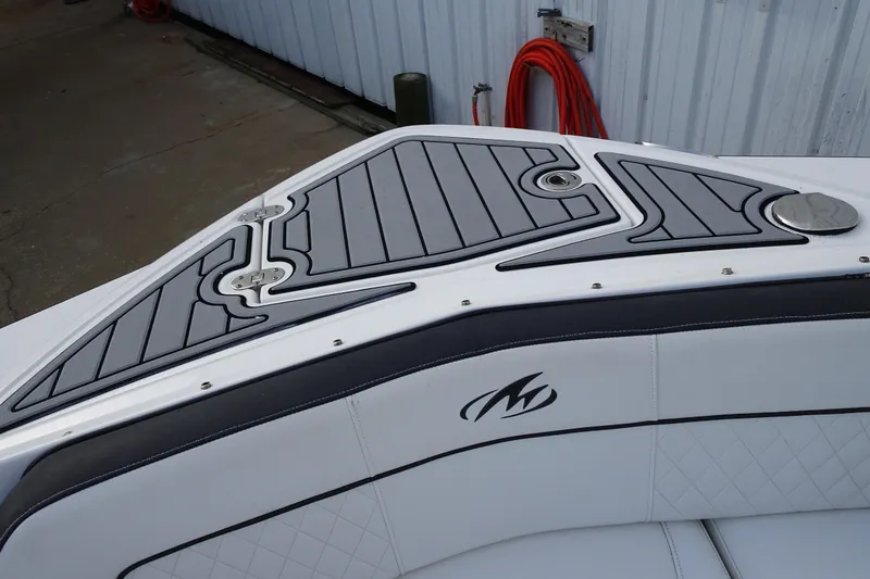 Slide: The Image of 2017 Monterey M-65 boat deck with sleek design and logo detailing. - 25
