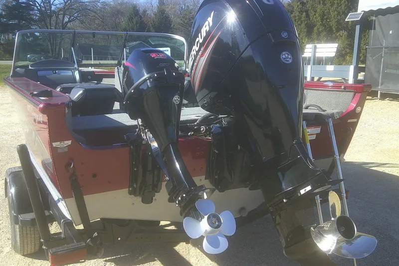 Slide: The Image of 2017 Lund 1875 Crossover XS boat with dual Mercury outboard motors. - 24