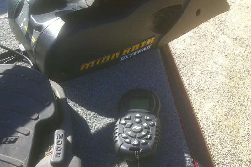 Slide: The Image of Minn Kota Ulterra trolling motor and remote on Lund 1875 Crossover XS, 2017 model. - 6