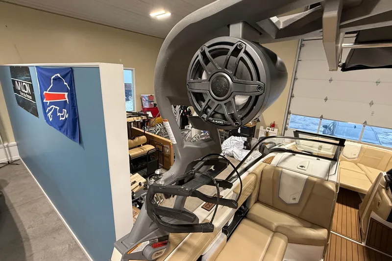 Slide: The Image of 2020 Nautique Super Air Nautique G21 interior with speaker and wakeboard rack. - 7