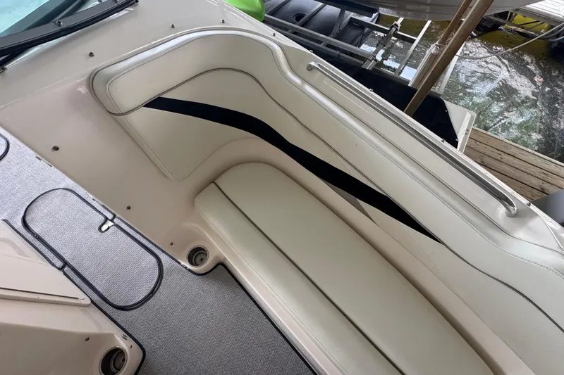 Slide: The Image of 2006 Rinker 282 Captiva Bowrider interior seating with sleek design and comfortable upholstery. - 20