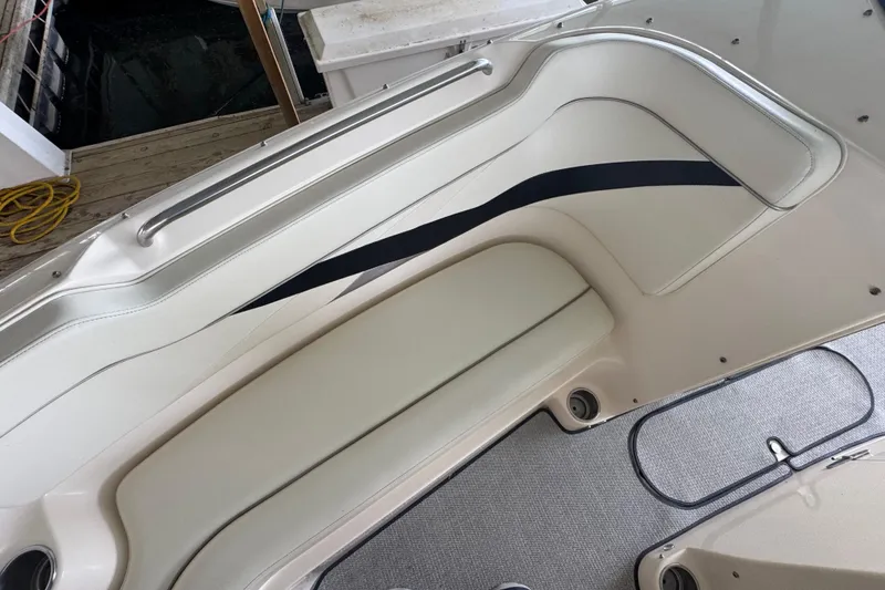 Slide: The Image of 2006 Rinker 282 Captiva Bowrider interior seating with sleek design and comfortable upholstery. - 21