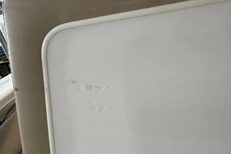 Slide: The Image of Close-up of a 2026 Tahoe 2150 CC boat interior with textured surface detail. - 5