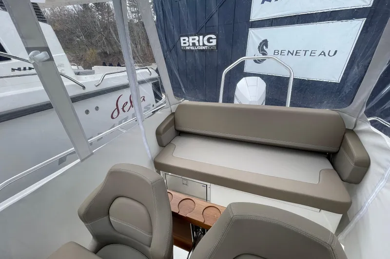 Slide: The Image of Interior view of 2023 Nimbus Tender 8 boat with seating and console. - 16