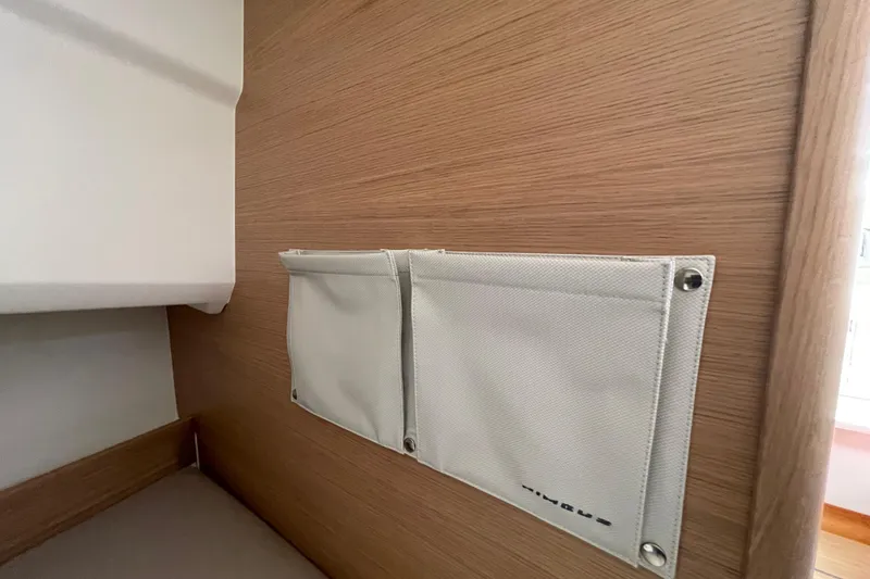 Slide: The Image of Interior of 2023 Nimbus Tender 8 with wall-mounted storage pocket. - 34