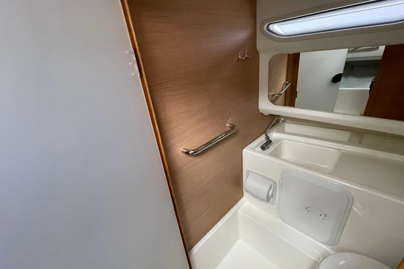 Slide: The Image of Modern bathroom interior of 2023 Nimbus Tender 8 boat, featuring sleek design and fixtures. - 41