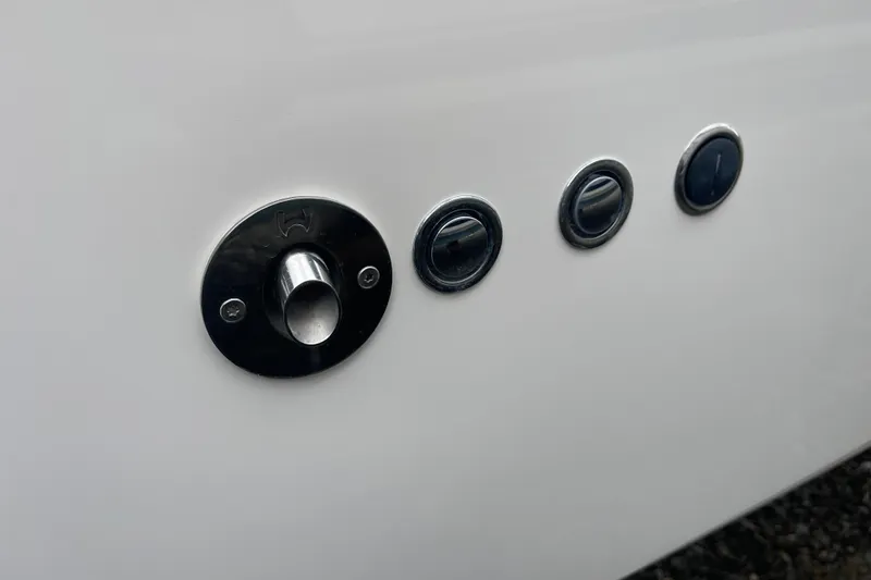 Slide: The Image of Close-up of 2023 Nimbus Tender 8 boat fittings on white surface. - 49