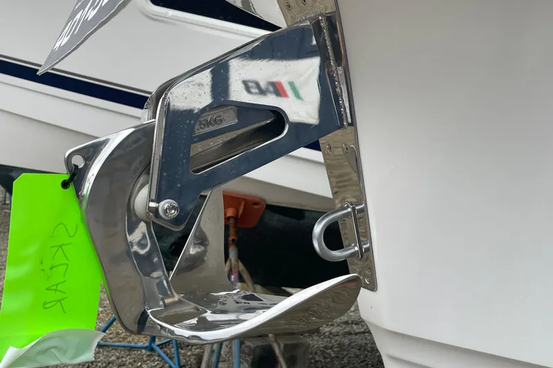 Slide: The Image of Close-up of a 2023 Nimbus Tender 8 boat anchor with reflective metal finish. - 9