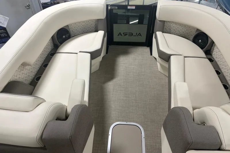 Slide: The Image of Luxurious interior of 2026 Alera M25Q boat with plush seating and modern design. - 12