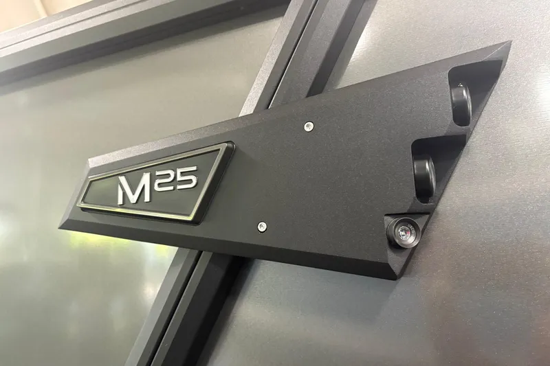 Slide: The Image of Close-up of 2026 Alera M25Q model badge on a sleek metallic surface. - 20