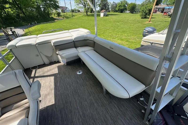 Slide: The Image of 2008 Voyager Pontoons 25 Extreme Cruise Express with spacious seating and scenic outdoor view. - 10