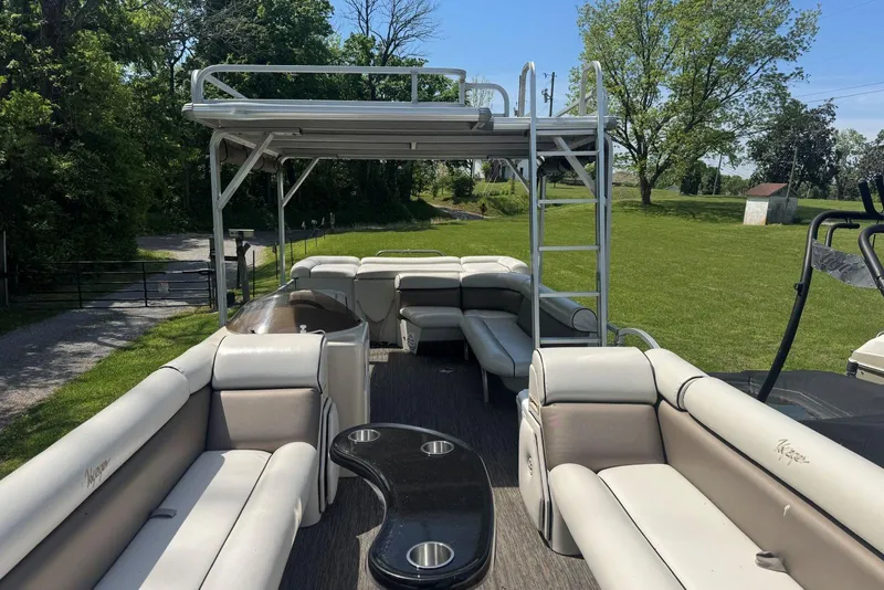 Slide: The Image of 2008 Voyager Pontoons 25 Extreme Cruise Express with spacious seating and upper deck. - 7