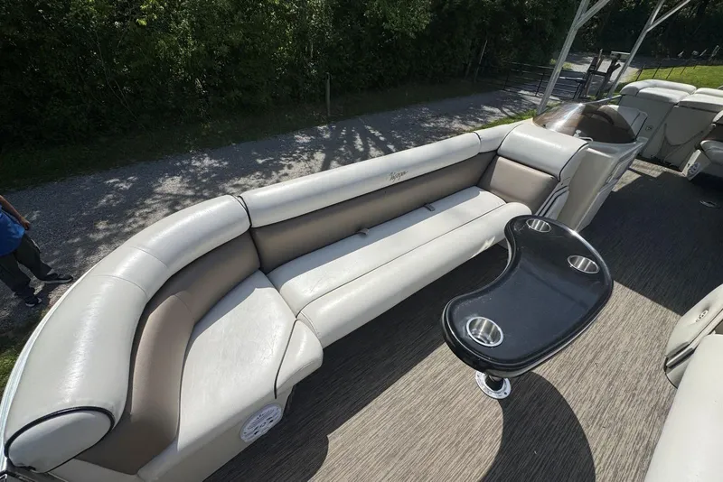Slide: The Image of 2008 Voyager Pontoons 25 Extreme Cruise Express with spacious seating and cup holders. - 9