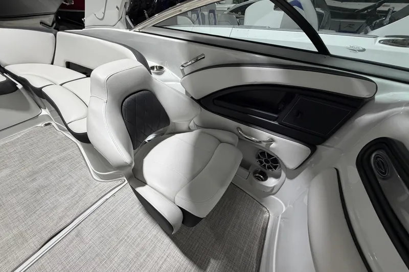 Slide: The Image of Interior of 2023 Crownline 280 SS boat with luxurious seating and modern design. - 13