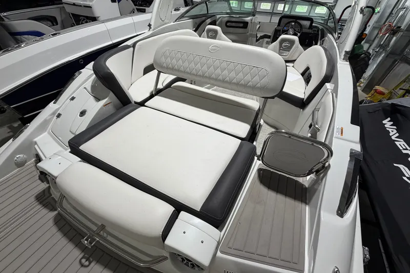 Slide: The Image of 2023 Crownline 280 SS boat interior with luxurious seating and modern design. - 16
