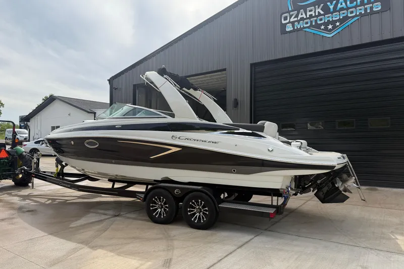 Slide: The Image of 2023 Crownline 280 SS boat on trailer outside Ozark Yachts & Motorsports. - 2