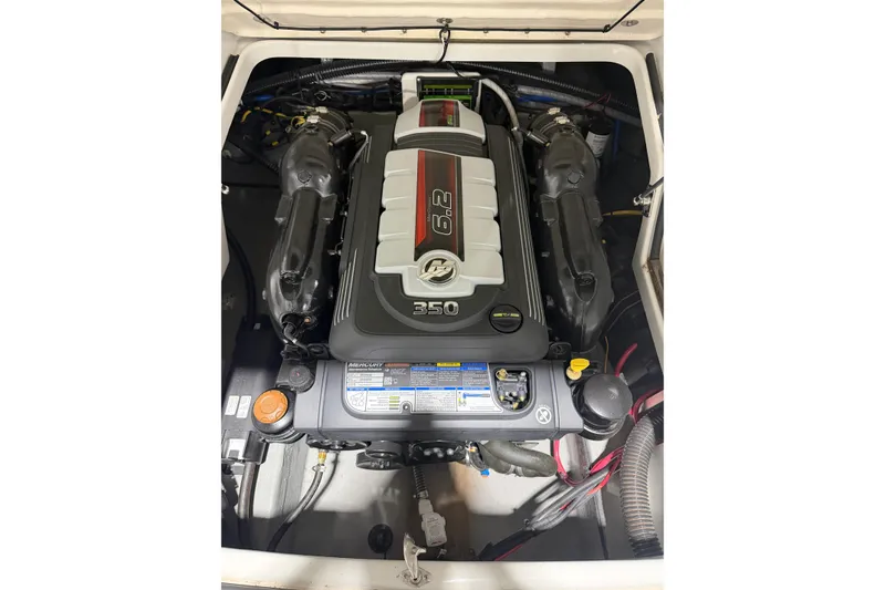 Slide: The Image of 2023 Crownline 280 SS engine compartment showcasing a powerful 6.2L engine. - 21