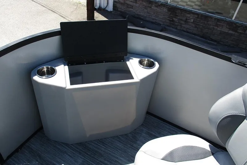 Slide: The Image of 2026 Bentley Pontoons Fish 243 4-Point interior with cup holders and seating. - 10