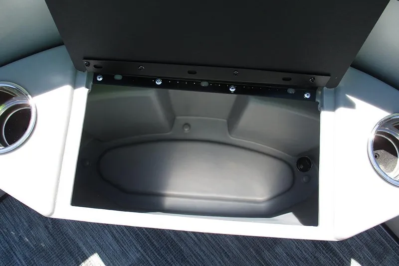 Slide: The Image of Open storage compartment on 2026 Bentley Pontoons Fish 243 4-Point with cup holders. - 11