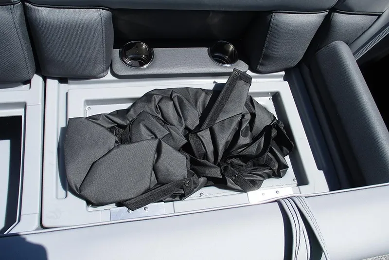 Slide: The Image of Storage compartment in 2026 Bentley Pontoons Fish 243 4-Point with cup holders and fabric bag. - 19