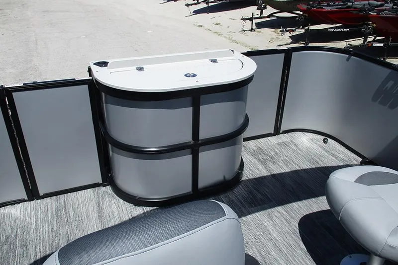 Slide: The Image of 2026 Bentley Pontoons Fish 243 4-Point interior with seating and storage unit. - 21