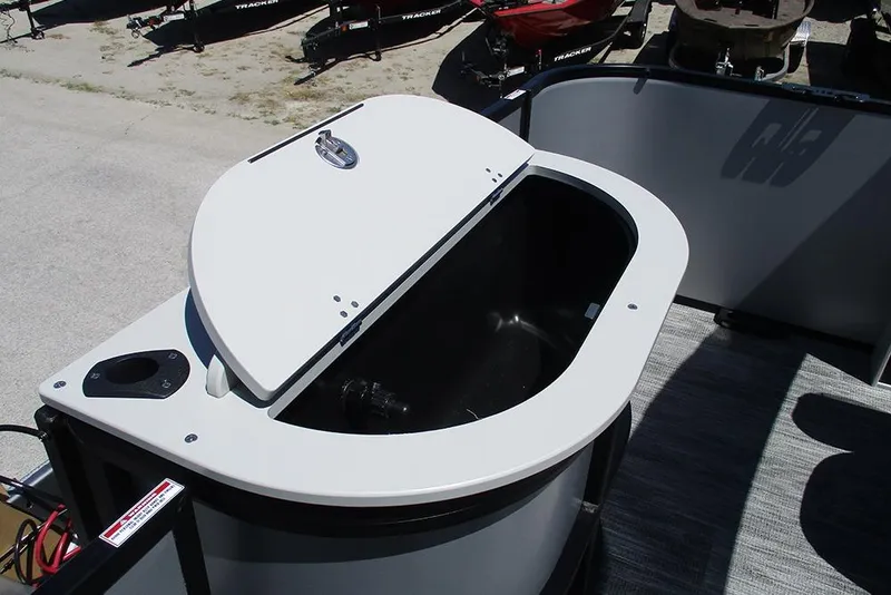 Slide: The Image of 2026 Bentley Pontoons Fish 243 4-Point livewell, open lid, on a pontoon boat deck. - 22