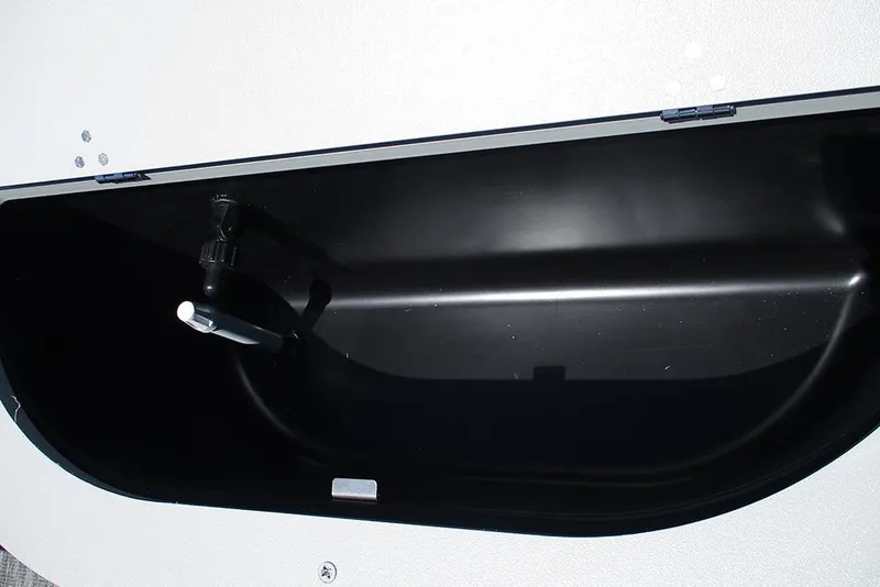 Slide: The Image of 2026 Bentley Pontoons Fish 243 4-Point storage compartment, featuring a sleek black interior design. - 23