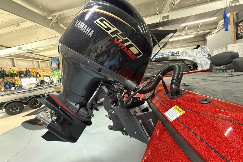 Slide: The Image of 2026 Skeeter ZX150 boat with Yamaha SHO VMAX engine in showroom. - 16