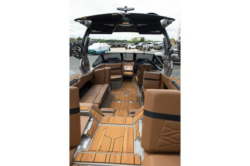 Slide: The Image of 2025 Supra SE 550 boat interior with luxurious seating and modern design. - 12