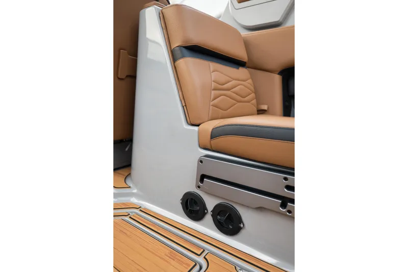 Slide: The Image of 2025 Supra SE 550 interior with tan leather seating and sleek design elements. - 20