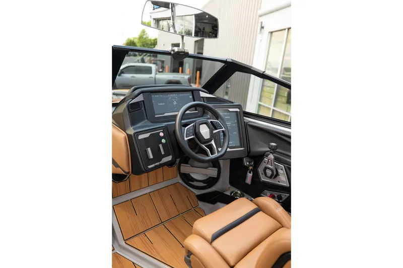 Slide: The Image of 2025 Supra SE 550 boat interior with modern dashboard and luxurious seating. - 27